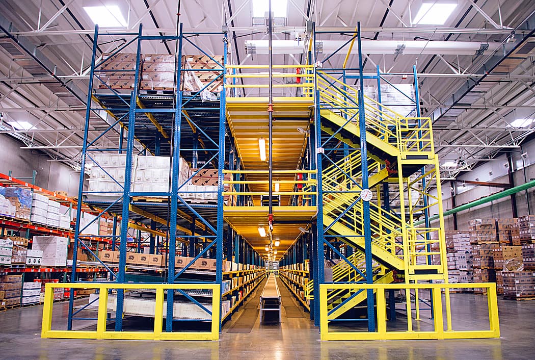 Mezzanine and workstation systems in an industrial facility
