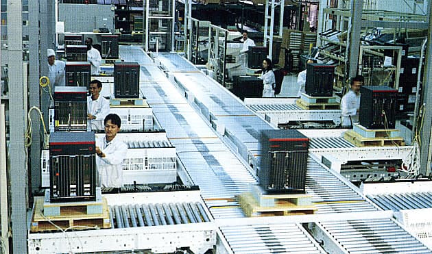 Electronics assembly line with automated material handling systems