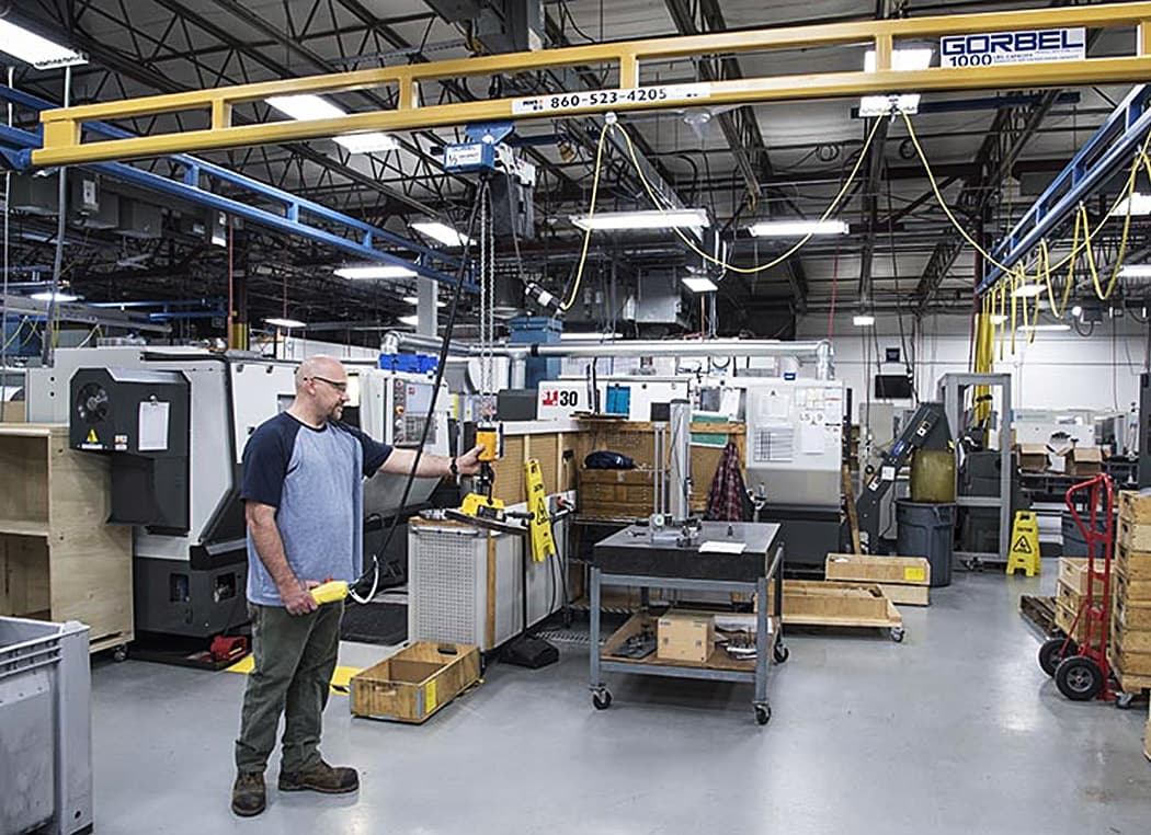Industrial overhead bridge crane in a manufacturing facility